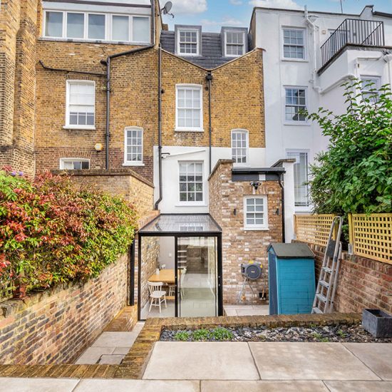 Listed Building Grade II glass structures storey extension and new build brickwall along with internal reconfiguration and landscaping.